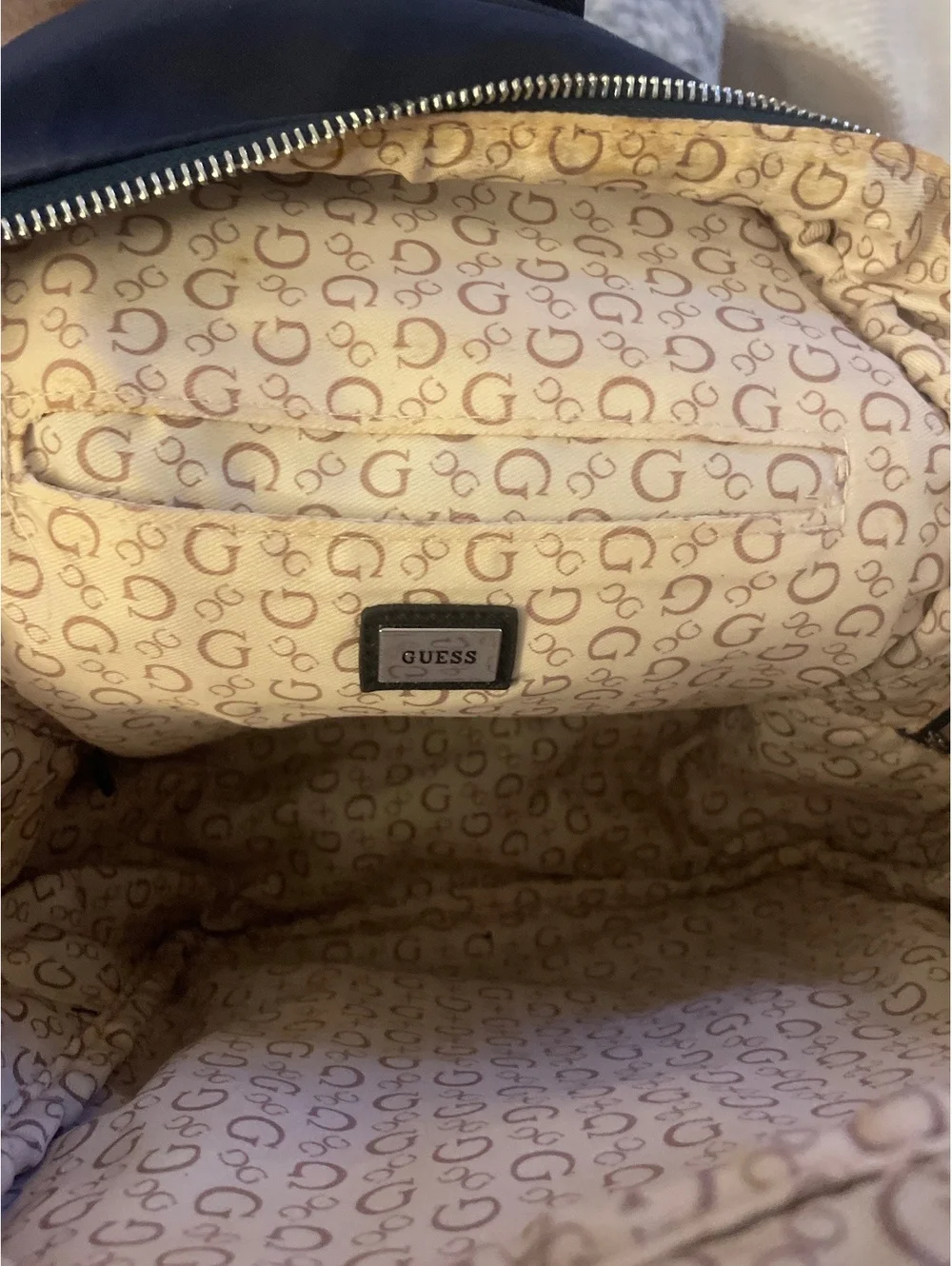 Guess Navy Blue Mini Backpack with Front Pocket and Adjustable Straps